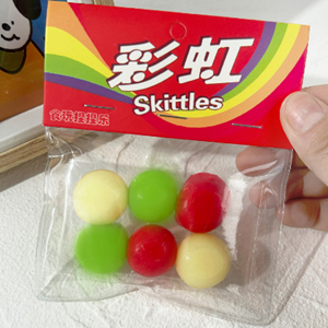 squeeze Skittles